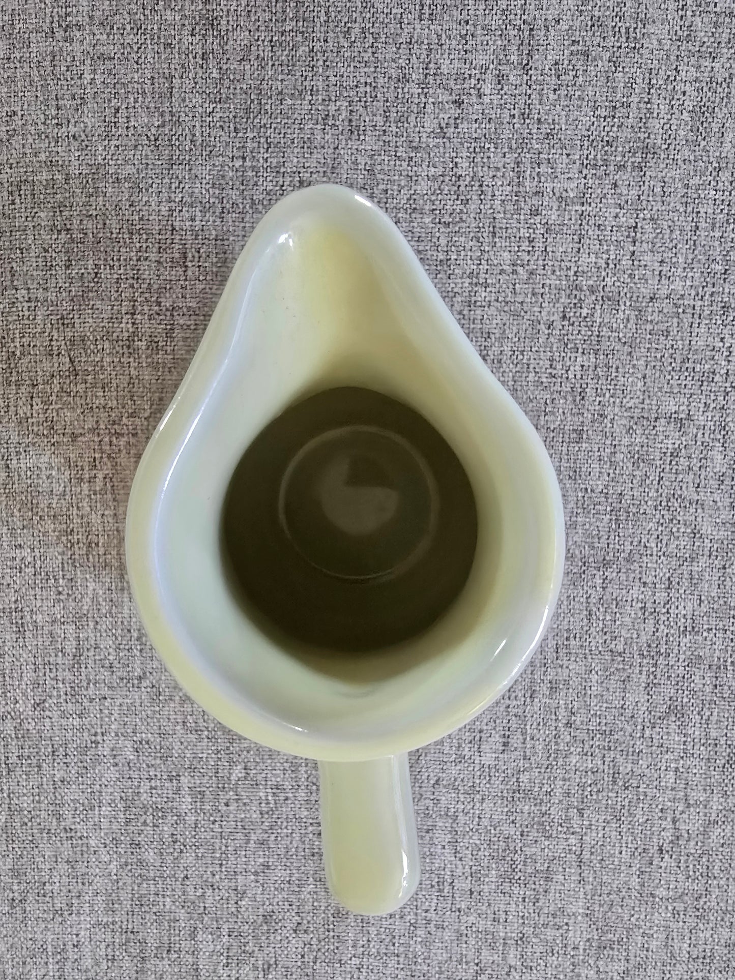 Coffee shop creamer, made in the USA. Light yellow